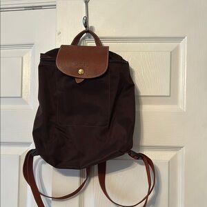 Longchamp Brown Backpack small w/Leather Flap. authentic -14”long  x 10” wide.